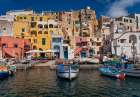 Europe-Italy-Procida-City houses and boats in Marina Corricella Art Print